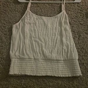 slight crop cream tank top size L juniors. never worn